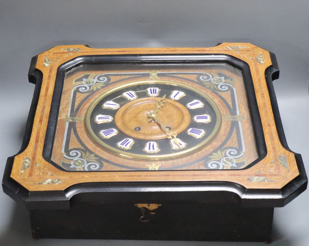 A French inlaid wall clock, spring-driven gong-striking movement, with pendulum, 50cm sq.